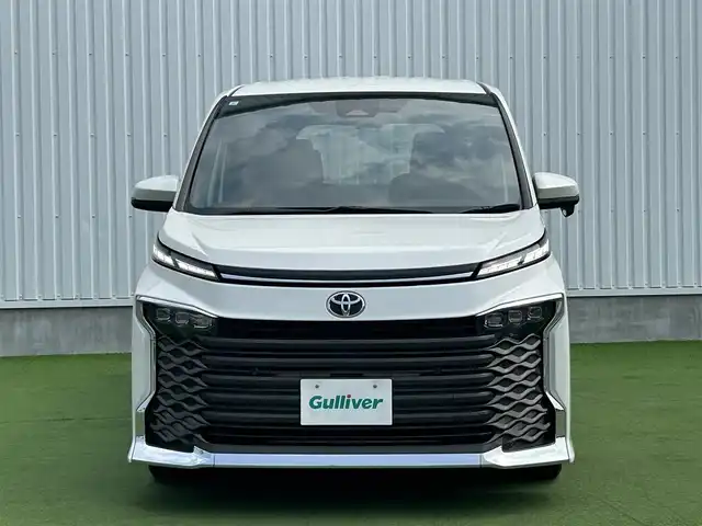 トヨタ ヴォクシー S－Z 香川県 2024(令6)年 1.4万km ホワイトパールクリスタルシャイン トヨタセーフティーセンス/・プリクラッシュ/・LTA/純正10.5型ナビ/バックカメラ/両側パワースライドドア/ハーフレザーシート/シートヒーター/革巻きステアリング/ステアリングリモコン/レーダークルーズ/電動パーキング/オートホールド/サンシェード/スマートキー/プッシュスタート