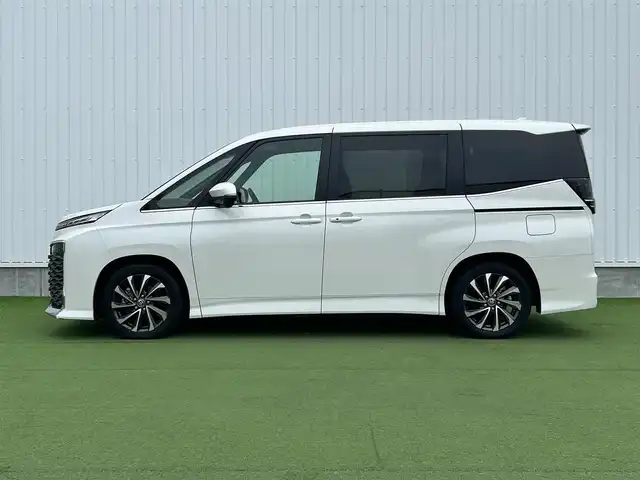 トヨタ ヴォクシー S－Z 香川県 2024(令6)年 1.4万km ホワイトパールクリスタルシャイン トヨタセーフティーセンス/・プリクラッシュ/・LTA/純正10.5型ナビ/バックカメラ/両側パワースライドドア/ハーフレザーシート/シートヒーター/革巻きステアリング/ステアリングリモコン/レーダークルーズ/電動パーキング/オートホールド/サンシェード/スマートキー/プッシュスタート