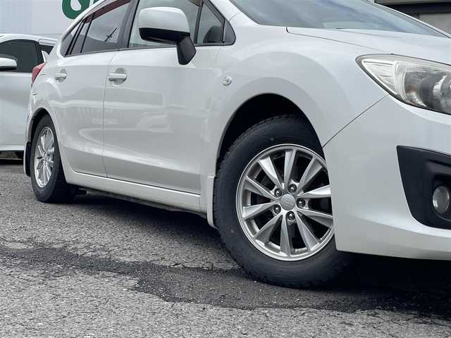 スバル インプレッサ スポーツ 1．6i－L 福島県 2013(平25)年 9.2万km サテンホワイトパール 社外ＳＤナビ/・フルセグＴＶ/・ＣＤ/・ＤＶＤ/・Ｂｌｕｅｔｏｏｔｈ/・ＵＳＢ/バックカメラ/アイドリングストップ/横滑り防止/社外ＥＴＣ/プッシュスタート/・スペアキー1本/純正フロアマット/保証書/取扱説明書