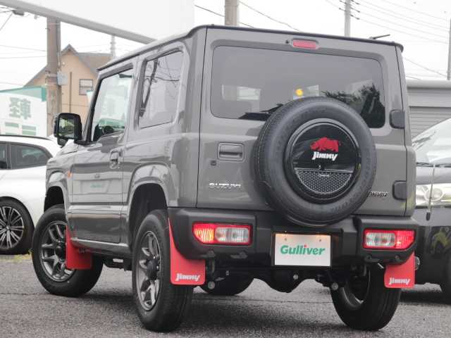 スズキ ジムニー XC 千葉県 2025(令7)年 0.1万km未満 ミディアムグレー 届出済未使用車/ビルトインＥＴＣ（ディーラーOP）/マッドフラップ（ディーラーOP）/スペアタイヤハーフカバーデカール（ディーラーOP）/フロントグリル（ディーラーOP）/スズキセーフティーサポート/衝突軽減ブレーキ/車線逸脱警報/ヒルディセントコントロール/クルーズコントロール/アイドリングストップ/クリアランスソナー/シートヒーター　/LEDヘッドライト/オートライト/スマートキー/純正フロアマット/電動格納ミラー/取扱説明書/保証書/スペアキー