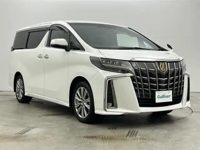 トヨタ アルファード S タイプゴールドⅡ 岡山県 2022(令4)年 1.4万km ホワイトパールクリスタルシャイン 9インチディスプレイオーディオ/・FM/AM/Bluetooth/フルセグ/CD/DVD/CarPlay/バックカメラ/12.1インチフリップダウンモニター/パワーバックドア/両側パワースライドドア/100V充電/ドライブレコーダー/ビルトインETC2.0/トヨタセーフティーセンス/・プリクラッシュセーフティ/・レーントレーシングアシスト/・レーダークルーズコントロール/・アダプティブハイビームシステム/・コーナーセンサー/オートブレーキホールド/MTモード付シフト/ダブルエアコン/純正18インチアルミ/純正フロアマット