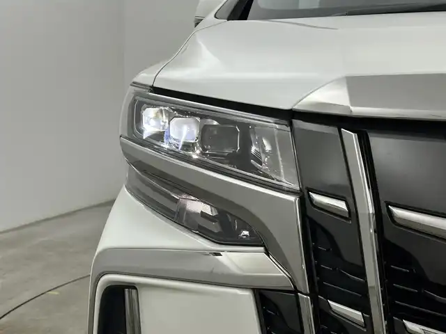 トヨタ アルファード S タイプゴールドⅡ 岡山県 2022(令4)年 1.4万km ホワイトパールクリスタルシャイン 9インチディスプレイオーディオ/・FM/AM/Bluetooth/フルセグ/CD/DVD/CarPlay/バックカメラ/12.1インチフリップダウンモニター/パワーバックドア/両側パワースライドドア/100V充電/ドライブレコーダー/ビルトインETC2.0/トヨタセーフティーセンス/・プリクラッシュセーフティ/・レーントレーシングアシスト/・レーダークルーズコントロール/・アダプティブハイビームシステム/・コーナーセンサー/オートブレーキホールド/MTモード付シフト/ダブルエアコン/純正18インチアルミ/純正フロアマット