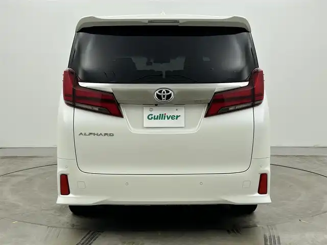 トヨタ アルファード S タイプゴールドⅡ 岡山県 2022(令4)年 1.4万km ホワイトパールクリスタルシャイン 9インチディスプレイオーディオ/・FM/AM/Bluetooth/フルセグ/CD/DVD/CarPlay/バックカメラ/12.1インチフリップダウンモニター/パワーバックドア/両側パワースライドドア/100V充電/ドライブレコーダー/ビルトインETC2.0/トヨタセーフティーセンス/・プリクラッシュセーフティ/・レーントレーシングアシスト/・レーダークルーズコントロール/・アダプティブハイビームシステム/・コーナーセンサー/オートブレーキホールド/MTモード付シフト/ダブルエアコン/純正18インチアルミ/純正フロアマット