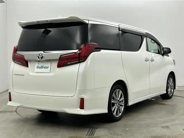 トヨタ アルファード S タイプゴールドⅡ 岡山県 2022(令4)年 1.4万km ホワイトパールクリスタルシャイン 9インチディスプレイオーディオ/・FM/AM/Bluetooth/フルセグ/CD/DVD/CarPlay/バックカメラ/12.1インチフリップダウンモニター/パワーバックドア/両側パワースライドドア/100V充電/ドライブレコーダー/ビルトインETC2.0/トヨタセーフティーセンス/・プリクラッシュセーフティ/・レーントレーシングアシスト/・レーダークルーズコントロール/・アダプティブハイビームシステム/・コーナーセンサー/オートブレーキホールド/MTモード付シフト/ダブルエアコン/純正18インチアルミ/純正フロアマット