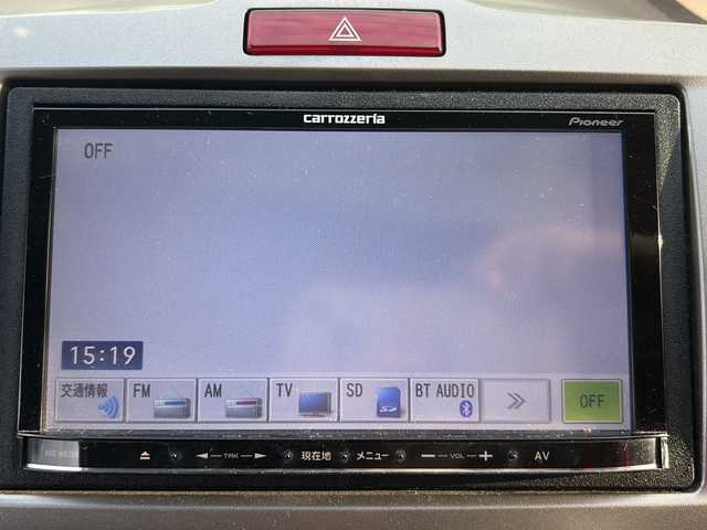 ホンダ フリード G ジャストセレクション 岐阜県 2011(平23)年 9.1万km プラチナホワイトパール 登録時走行距離90853km/社外7インチナビ（AVIC-MRZ99)/両側パワースライドドア/ワンセグTV/ウィンカーミラー/社外アルミホイール/キセノンヘッドライト/純正フロアマット/ウォークスルー/3列シート/Bluetooth接続/スマートキー/オートライト/エアバッグ/スペアキー/横滑り防止装置