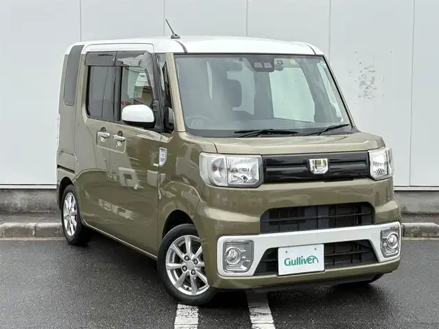ダイハツ ウェイク L レジャーエディション SA Ⅲ 三重県 2018(平30)年 6.4万km パールホワイトⅢ /オフビートカーキM 両側パワースライドドア/ETC/純正ナビ（Bluetooth/DVD/CD/地デジTV/SD）/TVキャンセラー/バックカメラ/ドライブレコーダー/スマートアシスト3/・衝突回避支援ブレーキ（対車両・歩行者）/・衝突警報（対車両・歩行者）/・車線逸脱警報/・誤発進抑制制御/・先行車発進お知らせ/・オートハイビーム/リアコーナーセンサー/純正ナビ装着アップグレードパック/ステアリングスイッチ/6スピーカー/LEDルームランプ/上下2段調整式デッキボード/イージーケアフロア/ユーリティフック/荷室床面フック/固定ベルト/オートエアコン/助手席下収納/ゴムフロアマット/UVカットガラス/チェック柄ファブリックシート/スペアキー