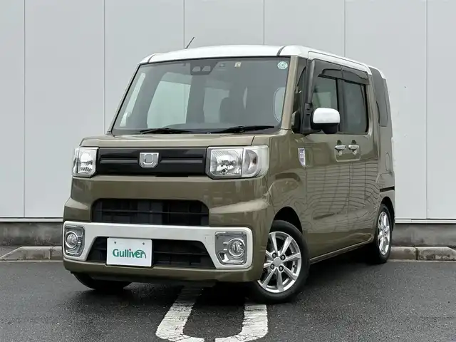 ダイハツ ウェイク L レジャーエディション SA Ⅲ 三重県 2018(平30)年 6.4万km パールホワイトⅢ /オフビートカーキM 両側パワースライドドア/ETC/純正ナビ（Bluetooth/DVD/CD/地デジTV/SD）/TVキャンセラー/バックカメラ/ドライブレコーダー/スマートアシスト3/・衝突回避支援ブレーキ（対車両・歩行者）/・衝突警報（対車両・歩行者）/・車線逸脱警報/・誤発進抑制制御/・先行車発進お知らせ/・オートハイビーム/リアコーナーセンサー/純正ナビ装着アップグレードパック/ステアリングスイッチ/6スピーカー/LEDルームランプ/上下2段調整式デッキボード/イージーケアフロア/ユーリティフック/荷室床面フック/固定ベルト/オートエアコン/助手席下収納/ゴムフロアマット/UVカットガラス/チェック柄ファブリックシート/スペアキー