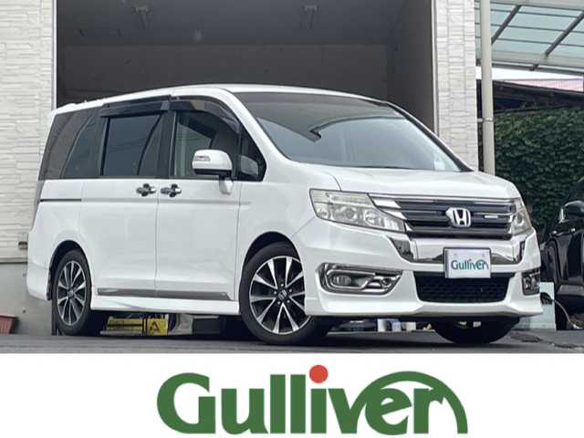 ホンダ ステップワゴン スパーダ Z クールスピリット 大分県 2014(平26)年 9.1万km ホワイトオーキッドパール 両側パワースライドドア /レザー調シートカバー/社外ナビ/フルセグTV/Bluetooth/DVD/純正ビルトインETC/純正17インチアルミホイール/社外フロアマット/純正フリップダウンモニター/オートライト