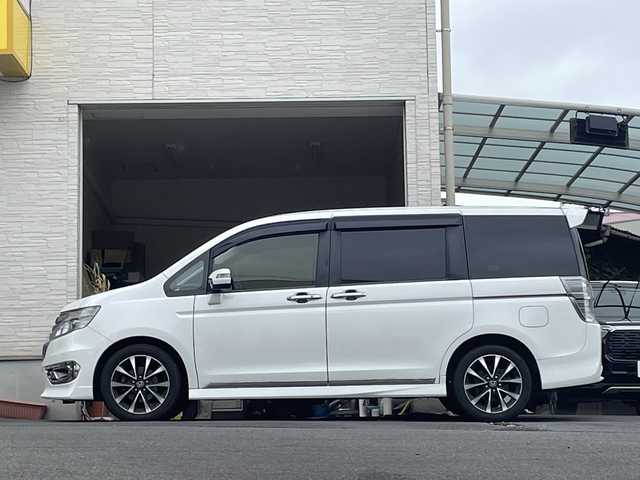 ホンダ ステップワゴン スパーダ Z クールスピリット 大分県 2014(平26)年 9.1万km ホワイトオーキッドパール 両側パワースライドドア /レザー調シートカバー/社外ナビ/フルセグTV/Bluetooth/DVD/純正ビルトインETC/純正17インチアルミホイール/社外フロアマット/純正フリップダウンモニター/オートライト