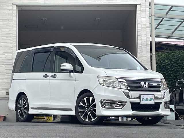 ホンダ ステップワゴン スパーダ Z クールスピリット 大分県 2014(平26)年 9.1万km ホワイトオーキッドパール 両側パワースライドドア /レザー調シートカバー/社外ナビ/フルセグTV/Bluetooth/DVD/純正ビルトインETC/純正17インチアルミホイール/社外フロアマット/純正フリップダウンモニター/オートライト
