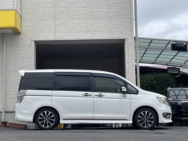 ホンダ ステップワゴン スパーダ Z クールスピリット 大分県 2014(平26)年 9.1万km ホワイトオーキッドパール 両側パワースライドドア /レザー調シートカバー/社外ナビ/フルセグTV/Bluetooth/DVD/純正ビルトインETC/純正17インチアルミホイール/社外フロアマット/純正フリップダウンモニター/オートライト