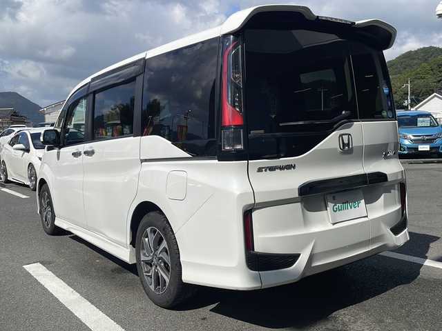 ホンダ ステップワゴン スパーダ 京都府 2015(平27)年 11.5万km ホワイトオーキッドパール 純正メモリナビ/BT/USBHDMI接続/DVD再生/フルセグ/バックカメラ/ホンダセンシング/レーダークルーズコントロール/レーンキープアシスト/両側パワースライドドア/LEDヘッドライト/わくわくゲート/ビルトインETC/純正16インチアルミ/スマートキー