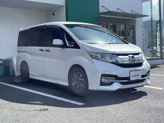 ホンダ ステップワゴン スパーダ 京都府 2015(平27)年 11.5万km ホワイトオーキッドパール 純正メモリナビ/BT/USBHDMI接続/DVD再生/フルセグ/バックカメラ/ホンダセンシング/レーダークルーズコントロール/レーンキープアシスト/両側パワースライドドア/LEDヘッドライト/わくわくゲート/ビルトインETC/純正16インチアルミ/スマートキー