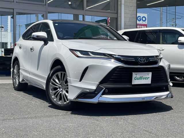 トヨタ ハリアー Z レザーパッケージ 青森県 2023(令5)年 1.3万km プラチナホワイトパールマイカ AIS検査評価点5点/ワンオーナー/モデリスタエアロ/シグネチャーイルミグリル/ドアミラーメッキ/バックドアガーニッシュメッキ/調光パノラマルーフ/スペアタイヤ/ディスプレイーディオＪＢＬナビ地デジ/パノラミックビューモニター/ブラインドスポットモニター/スペアタイヤ/スペアキー/LEDヘッドライト/インナーミラー/純正エンジンスターター/パワーバックドア/Toyota Safety Sense/新車時保証書/取扱説明書/社外１７ＡＷ冬タイヤ積み込み