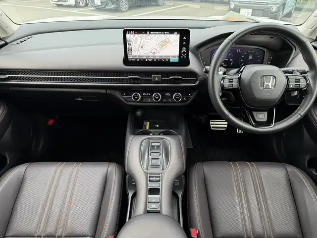 ホンダ ＺＲ－Ｖ ハイブリッド e:HEV Z 東京都 2023(令5)年 1.9万km プラチナホワイトパール BOSEサウンド/Honda SENSING/・衝突軽減ブレーキ/・誤発進抑制機能/・標識認識機能/・路外逸脱抑制機能/・車線維持支援システム/・先行車発進お知らせ機能/・アダプティブクルーズコントロール/・コーナーセンサー/マルチビューカメラシステム/プッシュスタート/純正9インチナビ/【FM/AM/USB/BT/フルセグTV】/ETC2.0/ワイヤレス充電器/レザーシート/パワーシート/シートヒーター/ステアリングヒーター/パワーテールゲート/LEDヘッドライト/オートライト/18インチ純正アルミホイール/スペアキー×１