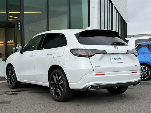 ホンダ ＺＲ－Ｖ ハイブリッド e:HEV Z 東京都 2023(令5)年 1.9万km プラチナホワイトパール BOSEサウンド/Honda SENSING/・衝突軽減ブレーキ/・誤発進抑制機能/・標識認識機能/・路外逸脱抑制機能/・車線維持支援システム/・先行車発進お知らせ機能/・アダプティブクルーズコントロール/・コーナーセンサー/マルチビューカメラシステム/プッシュスタート/純正9インチナビ/【FM/AM/USB/BT/フルセグTV】/ETC2.0/ワイヤレス充電器/レザーシート/パワーシート/シートヒーター/ステアリングヒーター/パワーテールゲート/LEDヘッドライト/オートライト/18インチ純正アルミホイール/スペアキー×１