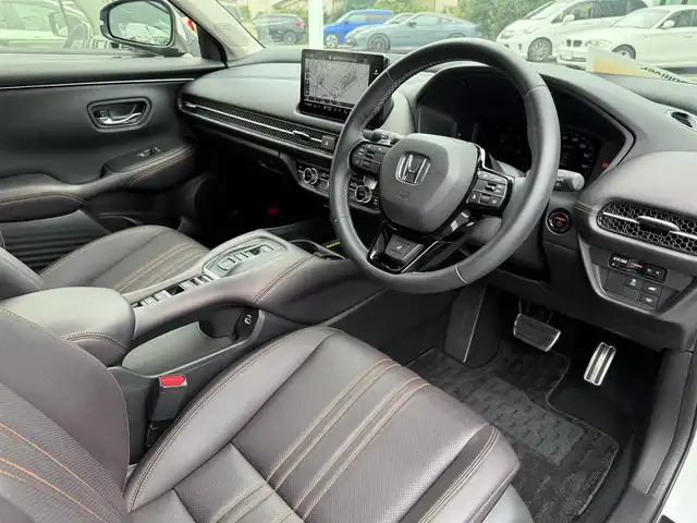 ホンダ ＺＲ－Ｖ ハイブリッド e:HEV Z 東京都 2023(令5)年 1.9万km プラチナホワイトパール BOSEサウンド/Honda SENSING/・衝突軽減ブレーキ/・誤発進抑制機能/・標識認識機能/・路外逸脱抑制機能/・車線維持支援システム/・先行車発進お知らせ機能/・アダプティブクルーズコントロール/・コーナーセンサー/マルチビューカメラシステム/プッシュスタート/純正9インチナビ/【FM/AM/USB/BT/フルセグTV】/ETC2.0/ワイヤレス充電器/レザーシート/パワーシート/シートヒーター/ステアリングヒーター/パワーテールゲート/LEDヘッドライト/オートライト/18インチ純正アルミホイール/スペアキー×１