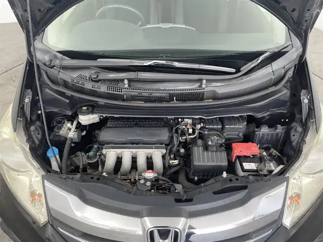 ホンダ フリード G プレミアムエディション 大分県 2015(平27)年 7.4万km プレミアムスパークルブラックパール 社外SDナビ/（フルセグ/CD/DVD/Bluetooth）/両側パワースライドドア/ビルトインETC/ハーフレザーシート/クルーズコントロール/ステアリングスイッチ/電動格納ミラー/HIDヘッドライト/オートライト/オートエアコン/スマートキー/保証書・取扱説明書