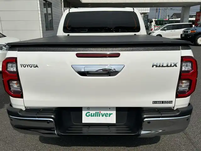トヨタ ハイラックス Z 広島県 2021(令3)年 4.8万km スーパーホワイトⅡ ワンオーナー/アルパインフローティングナビ/[BT/CD/USB/SD]/バックカメラ/レーダークルーズコントロール/衝突軽減ブレーキ装置/車線逸脱警報/パワーヒート/ダウンヒルアシストコントロール/社外マフラー[SUXON]/クリアランスソナー/トノカバー/マッドガード/プッシュスタート/スペアキー「スマートキー」/ETC/保証書/取扱説明書