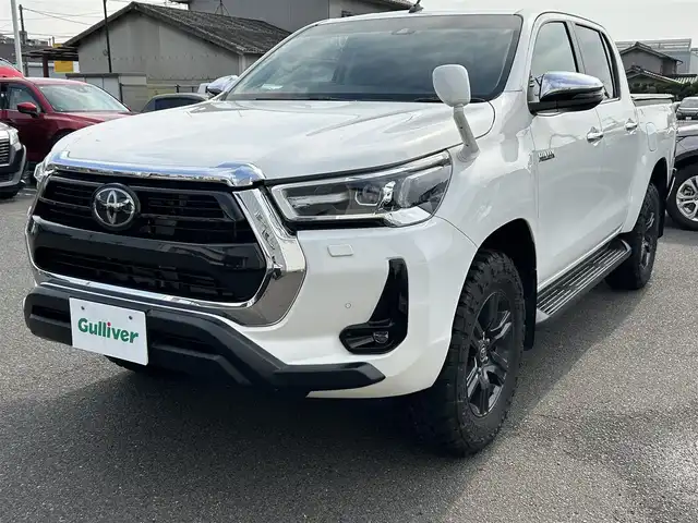 トヨタ ハイラックス Z 広島県 2021(令3)年 4.8万km スーパーホワイトⅡ ワンオーナー/アルパインフローティングナビ/[BT/CD/USB/SD]/バックカメラ/レーダークルーズコントロール/衝突軽減ブレーキ装置/車線逸脱警報/パワーヒート/ダウンヒルアシストコントロール/社外マフラー[SUXON]/クリアランスソナー/トノカバー/マッドガード/プッシュスタート/スペアキー「スマートキー」/ETC/保証書/取扱説明書