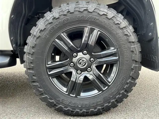 トヨタ ハイラックス Z 広島県 2021(令3)年 4.8万km スーパーホワイトⅡ ワンオーナー/アルパインフローティングナビ/[BT/CD/USB/SD]/バックカメラ/レーダークルーズコントロール/衝突軽減ブレーキ装置/車線逸脱警報/パワーヒート/ダウンヒルアシストコントロール/社外マフラー[SUXON]/クリアランスソナー/トノカバー/マッドガード/プッシュスタート/スペアキー「スマートキー」/ETC/保証書/取扱説明書