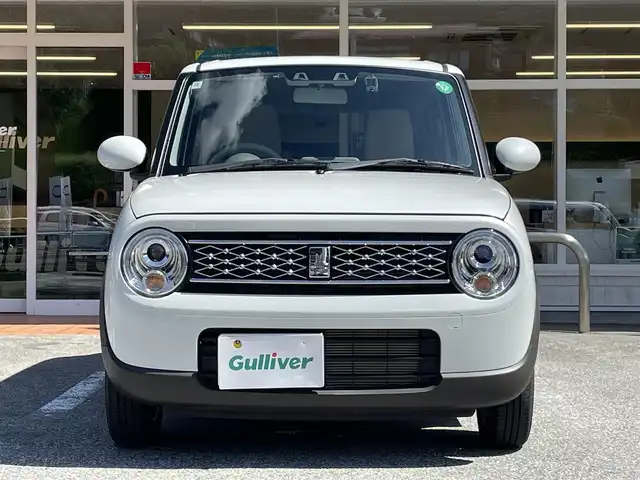スズキ ラパン X 岐阜県 2024(令6)年 0.2万km ピュアホワイトP ワンオーナー/4WD/純正ディスプレイオーディオ/【Bluetooth．AM/FMラジオ】/バックカメラ/スマートキー/ETC/ドライブレコーダー/ベンチシート/シートヒーター/純正フロアマット/純正アルミホイール/コーナーセンサー/オートライト/横滑り防止装置/レーンキープアシスト/衝突被害軽減ブレーキ/盗難防止装置/保証書/取扱説明書