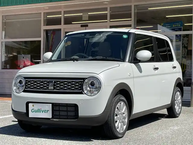 スズキ ラパン X 岐阜県 2024(令6)年 0.2万km ピュアホワイトP ワンオーナー/4WD/純正ディスプレイオーディオ/【Bluetooth．AM/FMラジオ】/バックカメラ/スマートキー/ETC/ドライブレコーダー/ベンチシート/シートヒーター/純正フロアマット/純正アルミホイール/コーナーセンサー/オートライト/横滑り防止装置/レーンキープアシスト/衝突被害軽減ブレーキ/盗難防止装置/保証書/取扱説明書