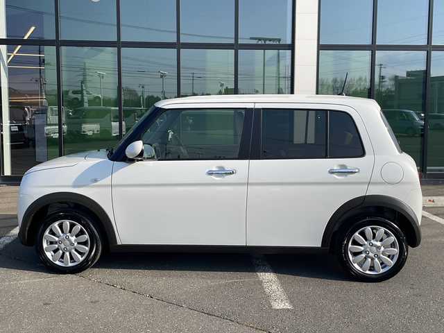 スズキ ラパン X 道東・釧路十勝 2024(令6)年 0.2万km ピュアホワイトP ワンオーナー/4WD/純正ディスプレイオーディオ/【Bluetooth．AM/FMラジオ】/バックカメラ/スマートキー/ETC/ドライブレコーダー/ベンチシート/シートヒーター/純正フロアマット/純正アルミホイール/コーナーセンサー/オートライト/横滑り防止装置/レーンキープアシスト/衝突被害軽減ブレーキ/盗難防止装置/保証書/取扱説明書