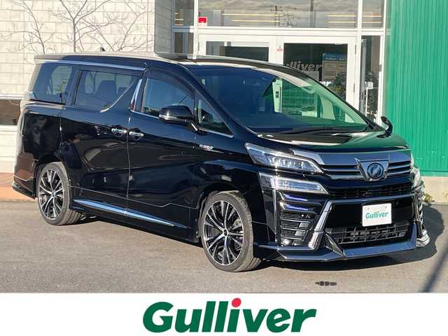 トヨタ ヴェルファイア ハイブリット ZR 青森県 2018(平30)年 6.6万km ブラック 4WD/純正10インチナビ・フルセグTV/CD・DVD・Bluetooth/純正12インチフリップダウンモニター/バックカメラ/黒合皮シート/前席エアシート・シートヒーター/助手席パワーオットマン/両側パワースライドドア/セーフティセンス/プリクラッシュセーフティ/レーダークルーズコントロール/レーントレーシングアシスト/オートマチックハイビーム/ビルトインETC/LEDヘッドライト/LEDフォグランプ/OP3眼LEDヘッドランプ/LEDフォグランプ/社外20インチアルミ/モデリスタエアロ