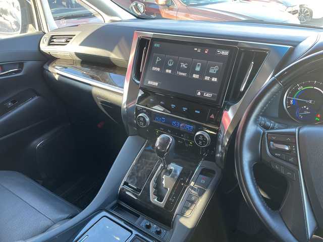 トヨタ ヴェルファイア ハイブリット ZR 青森県 2018(平30)年 6.6万km ブラック 4WD/純正10インチナビ・フルセグTV/CD・DVD・Bluetooth/純正12インチフリップダウンモニター/バックカメラ/黒合皮シート/前席エアシート・シートヒーター/助手席パワーオットマン/両側パワースライドドア/セーフティセンス/プリクラッシュセーフティ/レーダークルーズコントロール/レーントレーシングアシスト/オートマチックハイビーム/ビルトインETC/LEDヘッドライト/LEDフォグランプ/OP3眼LEDヘッドランプ/LEDフォグランプ/社外20インチアルミ/モデリスタエアロ