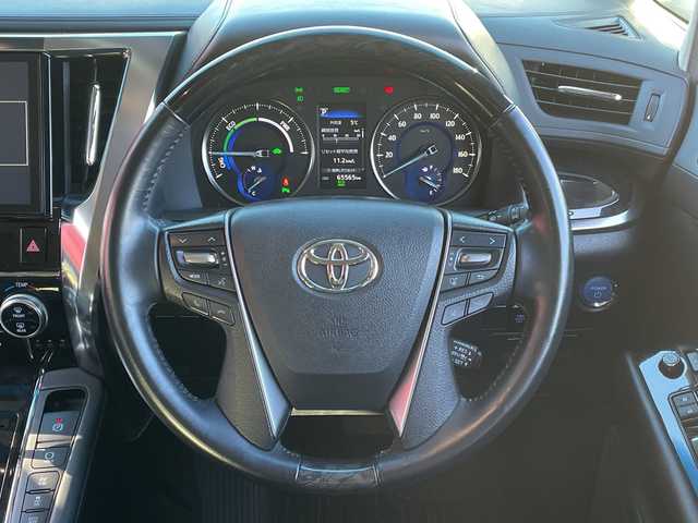トヨタ ヴェルファイア ハイブリット ZR 青森県 2018(平30)年 6.6万km ブラック 4WD/純正10インチナビ・フルセグTV/CD・DVD・Bluetooth/純正12インチフリップダウンモニター/バックカメラ/黒合皮シート/前席エアシート・シートヒーター/助手席パワーオットマン/両側パワースライドドア/セーフティセンス/プリクラッシュセーフティ/レーダークルーズコントロール/レーントレーシングアシスト/オートマチックハイビーム/ビルトインETC/LEDヘッドライト/LEDフォグランプ/OP3眼LEDヘッドランプ/LEDフォグランプ/社外20インチアルミ/モデリスタエアロ