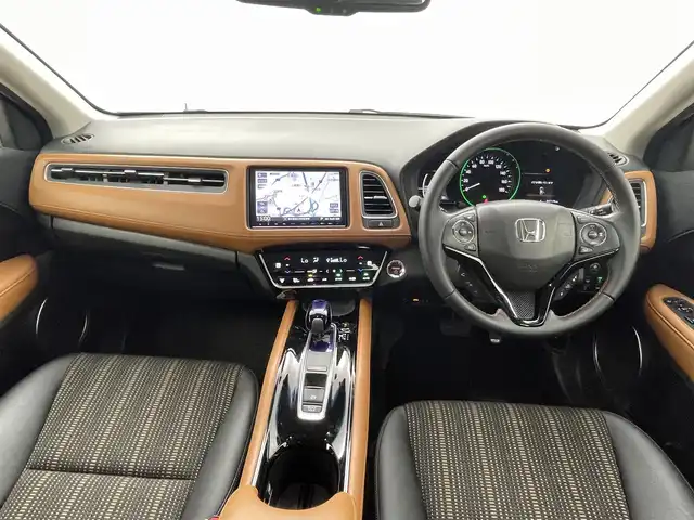 ホンダ ヴェゼル ハイブリッド Z ホンダセンシング 熊本県 2016(平28)年 4.8万km プレミアムクリスタルレッドM モデューロエアロ　/純正8インチナビ　/前後ドライブレコーダー　/バックカメラ　/ビルトインＥＴＣ　/前席シートヒーター　/ホンダセンシング/・衝突軽減ブレーキ/・レーンキープアシスト/・アダブティブクルーズコントロール/・先行車発進お知らせ機能/・路外逸脱抑制機能/・レーンキープアシスト/・標識認識システム/・オートハイビーム/横滑り防止/ハーフレザーシート/コーナーポール/電動パーキングサポート/ブレーキホールド/ジャズブラウン内装/純正フロアマット/純正17インチAW/オートライト/LEDヘッドライト/スマートキー/プッシュスタート/スペアキー1本