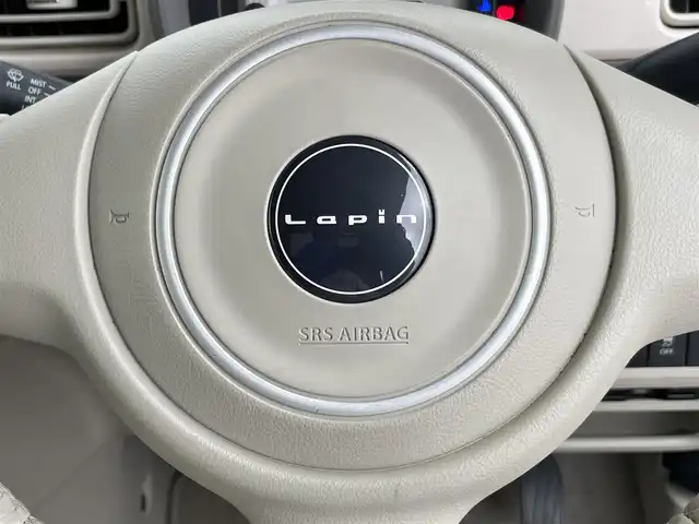 スズキ ラパン X 千葉県 2018(平30)年 4.7万km フォーンベージュメタリック/ホワイト2トーンルーフ 禁煙車/衝突軽減ブレーキ/横滑り防止装置/７型ワイドモニターナビ/フルセグ/Bluetooth接続/ＤＶＤ/ＣＤ再生可/バックカメラ/運転席シートヒーター/アイドリングストップ/プッシュスタート/HIDヘッドライト/オートライト/ビルトインETC/１４インチアルミホイール/運転席/助手席エアバッグ搭載