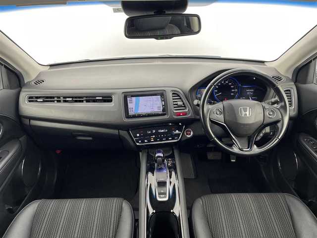 ホンダ ヴェゼル ハイブリッド Z 大分県 2016(平28)年 9.3万km ホワイトオーキッドパール 純正ナビ/シートヒーター/純正アルミホイル17インチ/純正フロアマット/ルーフレール/オートブレーキホールド/HDMI入力端子/USB入力端子/革巻ステアリング/ハーフレザー/スペアキー/バックカメラ