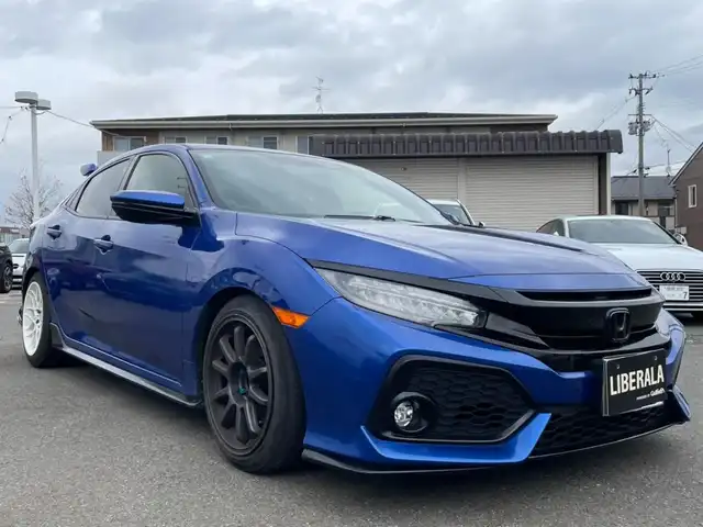 ホンダ シビック ハッチバック ホンダセンシング 岩手県 2019(平31)年 12.7万km プレミアムクリスタルブルークリスタル HONDA SENSING/(CMBS・LKA・ACC・LKAS・オートハイビーム)/6速MT/純正ナビTV/D/Nシートヒーター/ワンオーナー/ブレーキホールド/純正OPテールゲートスポイラー/デポレーシングブーストメーター/SPOONシフトノブ/社外17インチアルミ/(フロント：5次元 INPERIO リア：クリムゾン リネアスポーツ)/ロッソモデオマフラー/ブラックエンブレム(メーカーOP)/USサイドマーカー/Raysホイールナット/ZERO1000 エアクリーナー/シエクル ブローオフジェット/灯火類LED交換済/RSR TI‐2000 ダウンサス/SPOONシートベルトカバー/タイヤ前輪サマー 後輪スタッドレス