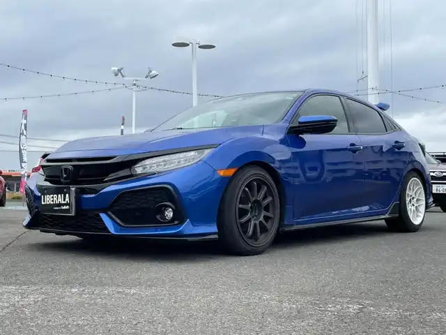 ホンダ シビック ハッチバック ホンダセンシング 岩手県 2019(平31)年 12.7万km プレミアムクリスタルブルークリスタル HONDA SENSING/(CMBS・LKA・ACC・LKAS・オートハイビーム)/6速MT/純正ナビTV/D/Nシートヒーター/ワンオーナー/ブレーキホールド/純正OPテールゲートスポイラー/デポレーシングブーストメーター/SPOONシフトノブ/社外17インチアルミ/(フロント：5次元 INPERIO リア：クリムゾン リネアスポーツ)/ロッソモデオマフラー/ブラックエンブレム(メーカーOP)/USサイドマーカー/Raysホイールナット/ZERO1000 エアクリーナー/シエクル ブローオフジェット/灯火類LED交換済/RSR TI‐2000 ダウンサス/SPOONシートベルトカバー/タイヤ前輪サマー 後輪スタッドレス