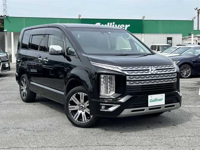 三菱 デリカＤ：５ P 千葉県 2020(令2)年 5.3万km ダイヤモンドブラックマイカ 衝突軽減ブレーキ/純正10.1インチSDナビ/・CD/DVD/MSV/Bluetooth/フルセグTV/純正フリップダウンモニター/全周囲カメラ/両後パワースライドドア/パワーバックドア/左後オートステップ/レーンキープアシスト/ブラインドスポットモニター/アダプティブクルーズコントロール/スマートキー/運転席パワーシート/前席シートヒーター/パドルシフト/AC100V100W電源/純正ドライブレコーダー/ETC/純正18インチアルミホイール/純正LEDヘッドライト/フォグランプ/本革巻きステアリング/木目調パネル/ドアバイザー/サイド＆カーテンエアバッグ/新車時保証書＆取扱説明書