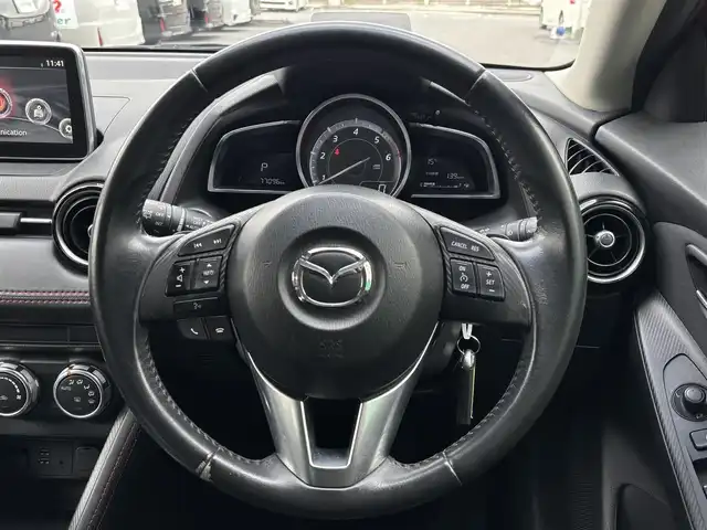 マツダ デミオ XD ツーリング 千葉県 2014(平26)年 7.8万km ソウルレッドプレミアムメタリック 純正ナビ/ヘッドアップディスプレイ/ディーゼルターボ/バックカメラ/ＥＴＣ/パドルシフト/チルトステアリング/クルーズコントロール/ステアリングスイッチ　/横揺れ防止装置/衝突軽減ブレーキ/純正アルミホイール/オートライト/地図SDあり