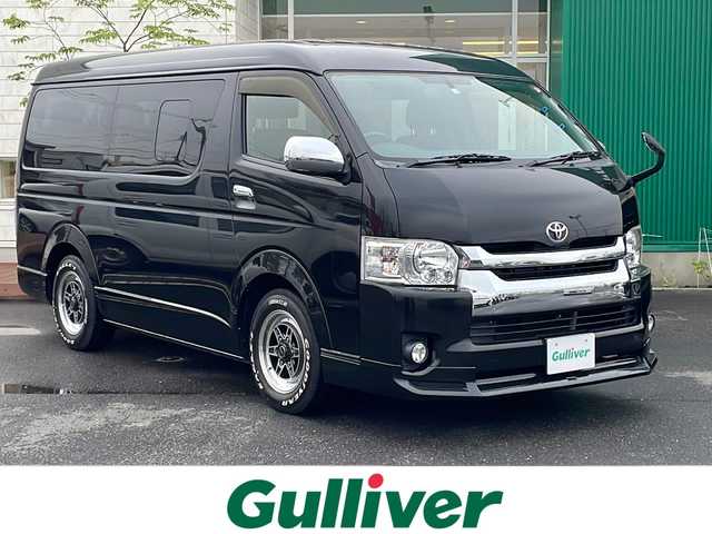 トヨタ ハイエース GL 青森県 2014(平26)年 9.2万km ブラックマイカ 4WD/社外SDナビ・フルセグTV/CD・DVD・SD/社外フリップダウンモニター/バックカメラ/OP左パワースライドドア/ウッドコンビハンドル/社外エンジンスターター/リアヒーター・クーラー/AC100V100W/ETC/革調シートカバー/OPスマートキー/OPプッシュスタート/LEDヘッドライト/LEDフォグランプ/SSRディバイド16インチAW/社外フロントスポイラー/社外テールレンズ/ボディ同色オーバーフェンダー