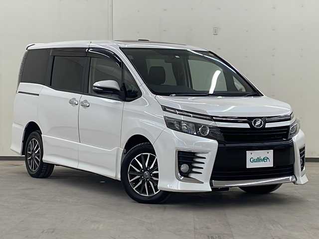 トヨタ ヴォクシー ZS 道央・札幌 2015(平27)年 17.1万km ホワイトパールクリスタルシャイン /4WD//社外ナビ/（AM/FM/TV/BT）//スペアキー//純正エンジンスターター//オートライト//フォグライト//ステアリングリモコン//プッシュスタート//バックカメラ//ETC//寒冷地仕様//ワイパーデアイサー//サンルーフ//サンシェード//純正フロアマット//ドアバイザー//純正16インチAW//冬タイヤ社外AWセット積込