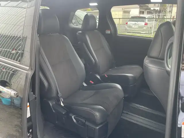 トヨタ エスティマ アエラス プレミアム 神奈川県 2017(平29)年 7.7万km ブラック ワンオーナー/純正ナビ(DVD/CD/AM/FM/BT/SD)/フルセグTV/純正フリップダウンモニター/バックカメラ/トヨタセーフティセンス/クルーズコントロール/レーンキープアシスト/オートハイビーム/横滑り防止装置/両側パワースライドドア/ハーフレザーシート/運転席パワーシート/2列シートオットマン付き/純正フットランプ/TEIN車高調/社外ウィンカーミラー(Silk Blazeレンズ)/前後ターンシグナルランプ社外LED電球/LEDヘッドライト/スマートキー　2本/保証書/取扱説明書＆ナビ取説