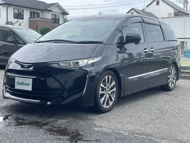 トヨタ エスティマ アエラス プレミアム 神奈川県 2017(平29)年 7.7万km ブラック ワンオーナー/純正ナビ(DVD/CD/AM/FM/BT/SD)/フルセグTV/純正フリップダウンモニター/バックカメラ/トヨタセーフティセンス/クルーズコントロール/レーンキープアシスト/オートハイビーム/横滑り防止装置/両側パワースライドドア/ハーフレザーシート/運転席パワーシート/2列シートオットマン付き/純正フットランプ/TEIN車高調/社外ウィンカーミラー(Silk Blazeレンズ)/前後ターンシグナルランプ社外LED電球/LEDヘッドライト/スマートキー　2本/保証書/取扱説明書＆ナビ取説