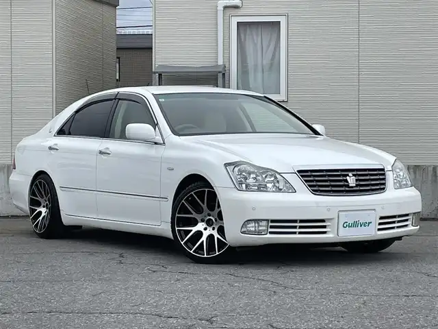 トヨタ クラウン ロイヤル RエクストラiFourQプレミア 青森県 2007(平19)年 7.4万km ホワイトパールクリスタルシャイン 4WD/純正HDDナビ/・フルセグTV/Am/FM/CD/MD/フォグランプ/コーナーセンサー/パワーシートD/N/純正フロアマット/クルーズコントロール/パーキングアシスト/横滑り防止機能/カーテンエアバッグ/AFS/オートライト/スペアキー/保証書/取扱説明書