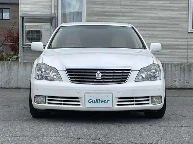トヨタ クラウン ロイヤル RエクストラiFourQプレミア 青森県 2007(平19)年 7.4万km ホワイトパールクリスタルシャイン 4WD/純正HDDナビ/・フルセグTV/Am/FM/CD/MD/フォグランプ/コーナーセンサー/パワーシートD/N/純正フロアマット/クルーズコントロール/パーキングアシスト/横滑り防止機能/カーテンエアバッグ/AFS/オートライト/スペアキー/保証書/取扱説明書