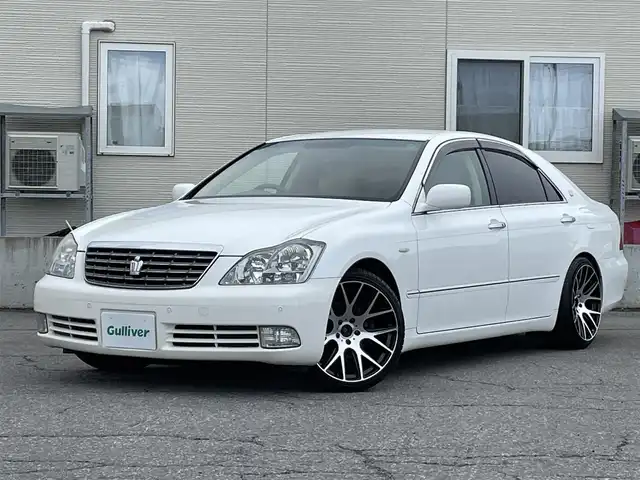 トヨタ クラウン ロイヤル RエクストラiFourQプレミア 青森県 2007(平19)年 7.4万km ホワイトパールクリスタルシャイン 4WD/純正HDDナビ/・フルセグTV/Am/FM/CD/MD/フォグランプ/コーナーセンサー/パワーシートD/N/純正フロアマット/クルーズコントロール/パーキングアシスト/横滑り防止機能/カーテンエアバッグ/AFS/オートライト/スペアキー/保証書/取扱説明書