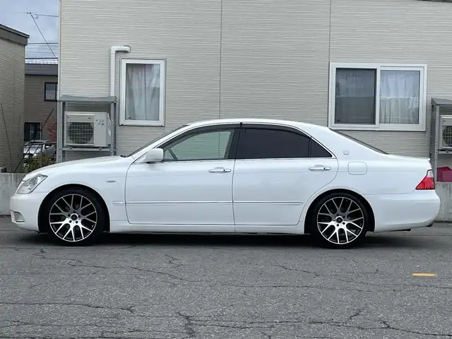 トヨタ クラウン ロイヤル RエクストラiFourQプレミア 青森県 2007(平19)年 7.4万km ホワイトパールクリスタルシャイン 4WD/純正HDDナビ/・フルセグTV/Am/FM/CD/MD/フォグランプ/コーナーセンサー/パワーシートD/N/純正フロアマット/クルーズコントロール/パーキングアシスト/横滑り防止機能/カーテンエアバッグ/AFS/オートライト/スペアキー/保証書/取扱説明書