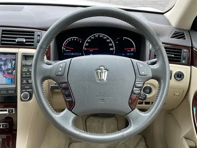 トヨタ クラウン ロイヤル RエクストラiFourQプレミア 青森県 2007(平19)年 7.4万km ホワイトパールクリスタルシャイン 4WD/純正HDDナビ/・フルセグTV/Am/FM/CD/MD/フォグランプ/コーナーセンサー/パワーシートD/N/純正フロアマット/クルーズコントロール/パーキングアシスト/横滑り防止機能/カーテンエアバッグ/AFS/オートライト/スペアキー/保証書/取扱説明書