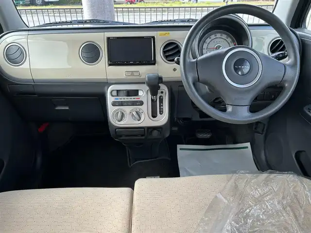 スズキ ラパン X 大阪府 2013(平25)年 5.3万km ベージュ 社外ナビ /・フルセグTV Bluetooth CD/DVD/バックカメラ /ETC  /アイドリングストップ /純正フロアマット /プッシュスタート /スマートキー /純正14インチスチール /ハロゲンヘッドライト/取説・保証書/スマートキー