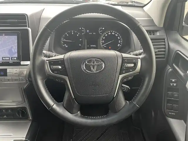 トヨタ ランドクルーザー プラド TX 道央・札幌 2018(平30)年 6.8万km ブラック ・４WD/・衝突軽減ブレーキ/・寒冷地仕様/・純正SDナビ/　CD＆DVD＆BT＆TV/・バックカメラ/・コーナーセンサー/・レーンキープアシスト/・ダウンヒルアシスト/・レーダークルーズコントロール/・ワイパー熱線/・ディーゼルターボ/・純正ドライブレコ―ダー/・エンジンスターター/・プッシュスタート/・スマートキー/・オートエアコン/・オートライト/・電動格納ミラー/・MT付きAT/・ビルトインETC/・社外フロアマット/・ドアバイザー/・ウィンカーミラー/・フォグライト/・LEDヘッドライト