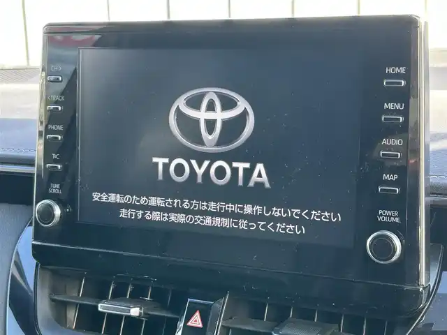 トヨタ カローラツーリング ハイブリッド ダブルバイビー 大阪府 2021(令3)年 4.7万km スパークリングブラックパールクリスタルシャイン トヨタセーフティセンス/・アダプティクブクルーズコントロール/・プリクラッシュセーフティー/・レーントレーシングアシスト/・クリアランスソナー/・オートマチックハイビーム/・ロードサインアシスト/純正9インチナビ/・Bluetooth/CD/DVD/AppleCarPlay/ラジオ/　Miracast/AndroidAuto/主要装備/・バックカメラ/・ブラインドスポットモニター/・ヘッドアップディスプレイ/・オートホールド/・ステアリングヒーター/・ステアリングリモコン/・TOMSエアロ（フロント・サイド・リアアンダー・マフラー有）/・ドライブレコーダー/・ETC2.0